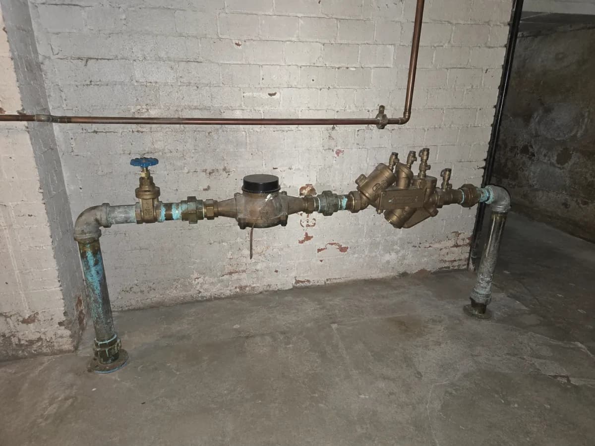 Meter room photographed wide enough to show access and surroundings
